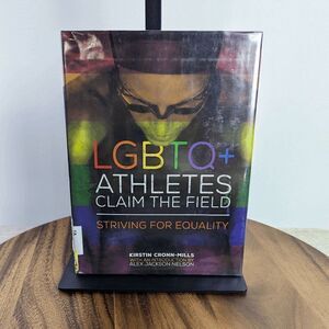 LGBTQ+ Athletes Claim the Field: Striving for Equality Library Binding – August
